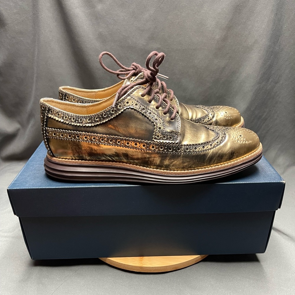 Gold Metallic Cole Haan in size 8 with shoe box

Non smoker & non pet owner